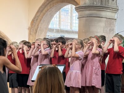Children performing in St Mary's Church, Rye